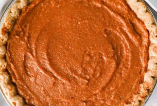 creamy maple sweet potato pie with golden crust and whipped cream